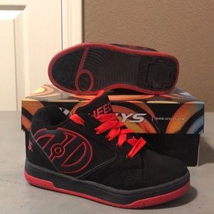 Heeleys youth size 3 like new!!!! Red and Black